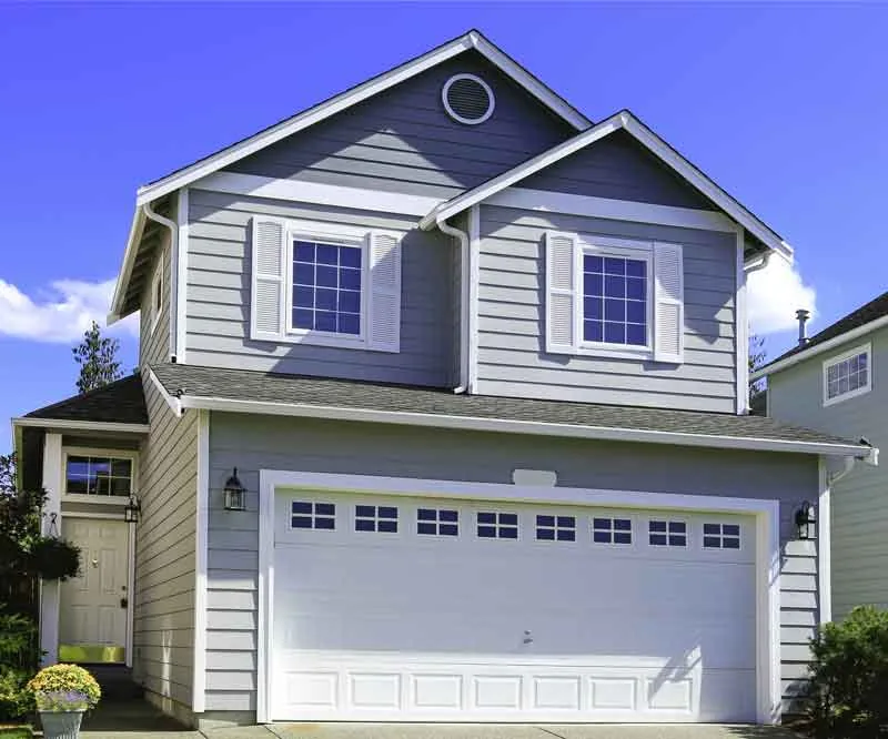 Greeley Garage Door Repair technician installing a garage door opener